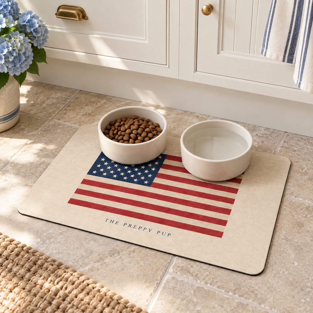 Old Glory Pet Mat with food and water bowls in a coastal kitchen